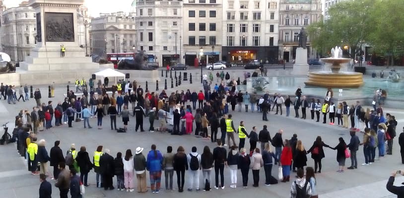 Living peace sign at Trafalgar Square - London