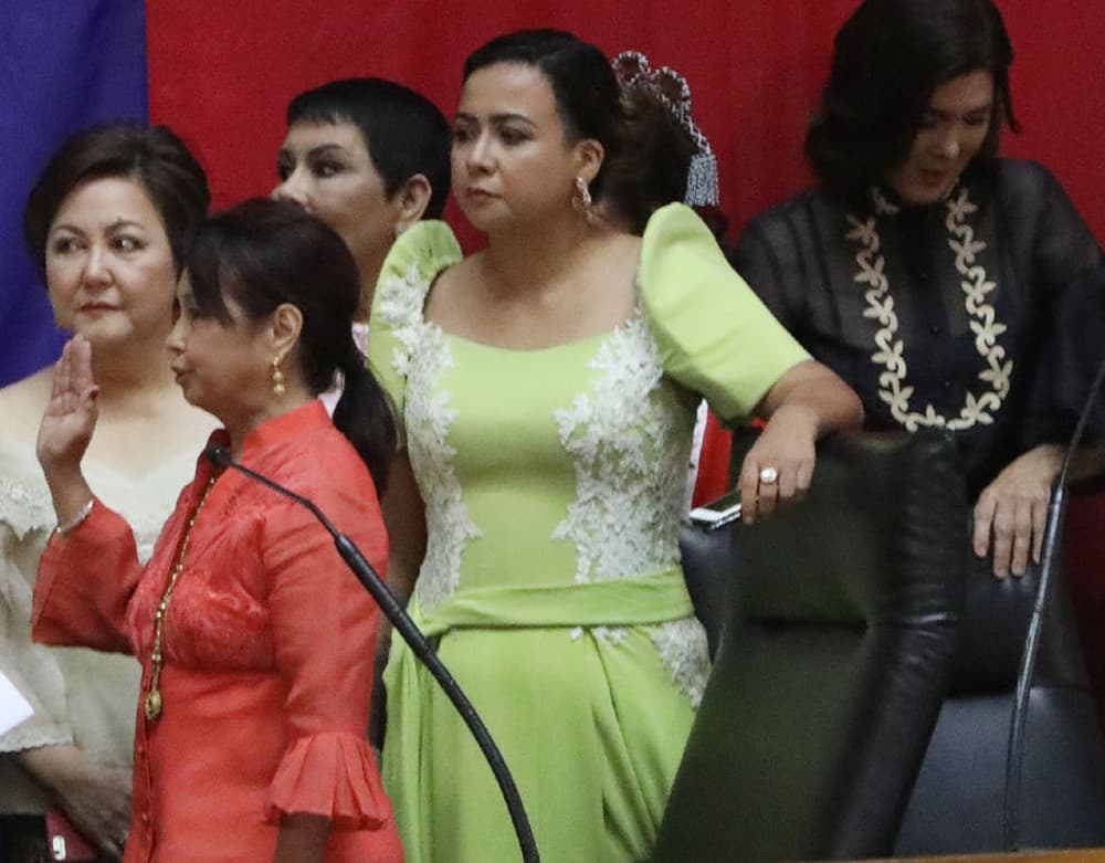 The oath of former President and Pampanga Representative Gloria Macapagal Arroyo (second from the right) as new House Speaker at the House of the Representative at the Bantasan Hills in Quezon City on July 23, 2018, Philippines. Photo by: Avito C. Dalan for the Philippine News Agency.